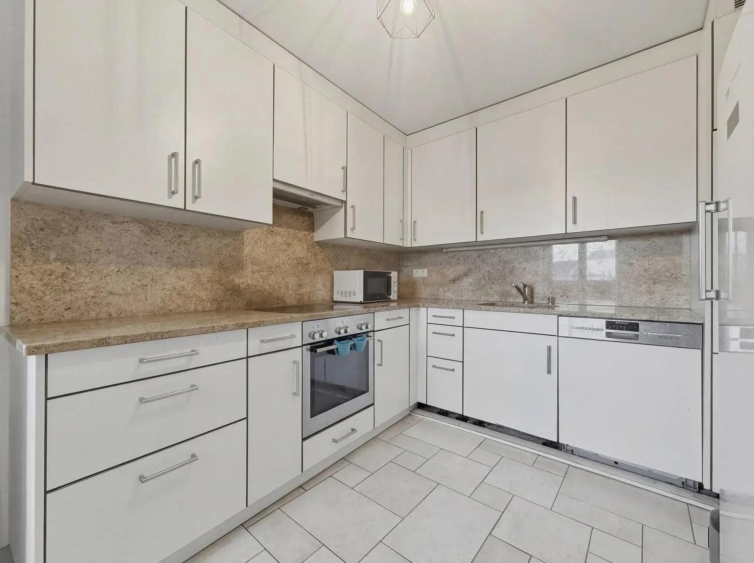 Magnifique appartement de 5 pièces avec garage à Plan-les-Ouates - Cuisine Magnifique appartement de 5 pièces avec garage à Plan-les-Ouates - Cuisine